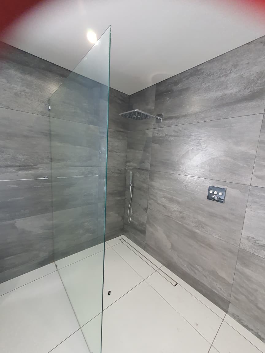 Frameless shower door